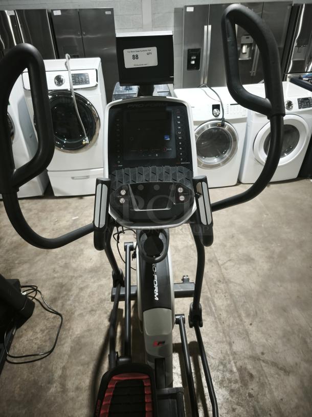 ProForm CoachLink E9.0 Elliptical, model PFEL59718, new condition, features digital display and ergonomic handles.