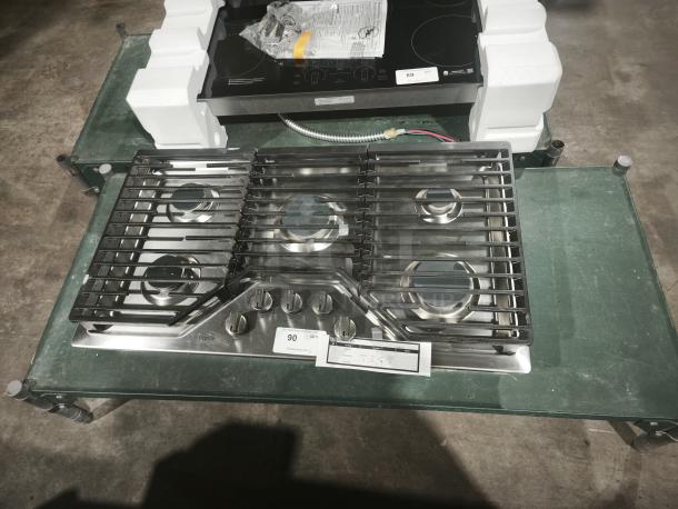 Profile 36 in. Gas Cooktop, stainless steel, 5 burners, model PGP7036SLSS, like new, with power boil burners, visible label.