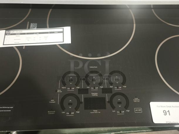 BRAND NEW CAFÉ™ Series 36" Energy Star induction cooktop, model CHP90361TBB, touch controls, precision cooking features.