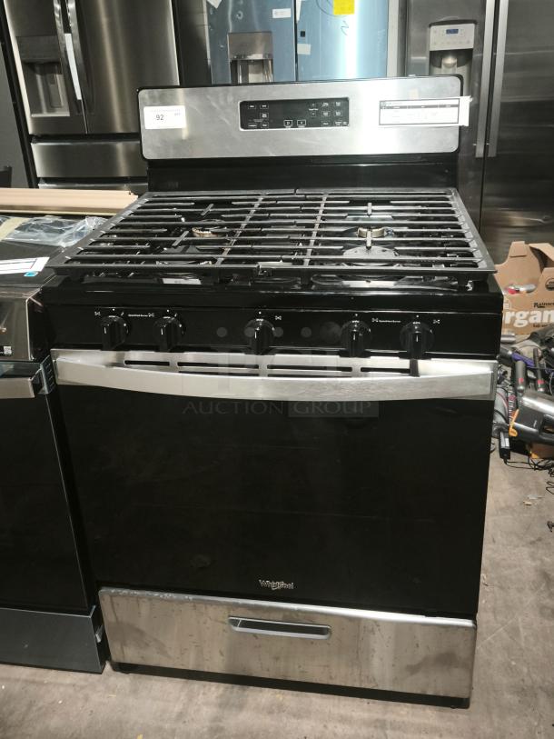 Whirlpool 30-in gas range, model WFG505M0MS, like new condition, 5 burners, stainless steel finish, freestanding design.
