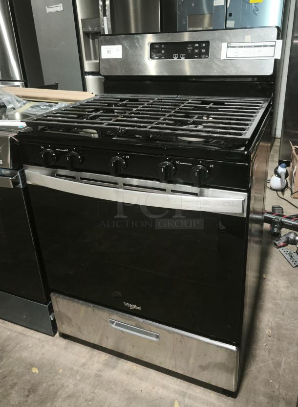 Whirlpool 30-in 5-burner gas range, model WFG505M0MS, stainless steel finish, like new condition, control panel visible.