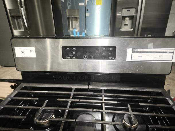 Whirlpool 30-in 5-burner natural gas range, model WFG505M0MS, in like-new condition. Stainless steel finish with electronic controls.