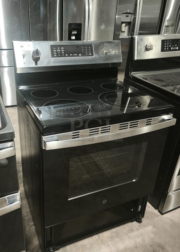 BRAND NEW GE® 30-inch Freestanding Electric Convection Range, Model GRF600AVSS, with Smart/WiFi features, minor scratches and dents.