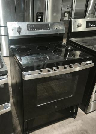 BRAND NEW GE® 30-inch Freestanding Electric Convection Range, Model GRF600AVSS, with Smart/WiFi features, minor scratches and dents.