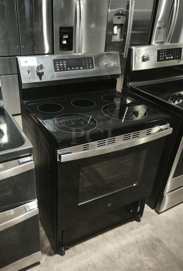 BRAND NEW: GE 30-inch Freestanding Electric Range, model GRF600AVSS, with convection, Smart/WiFi features, minor scratches.
