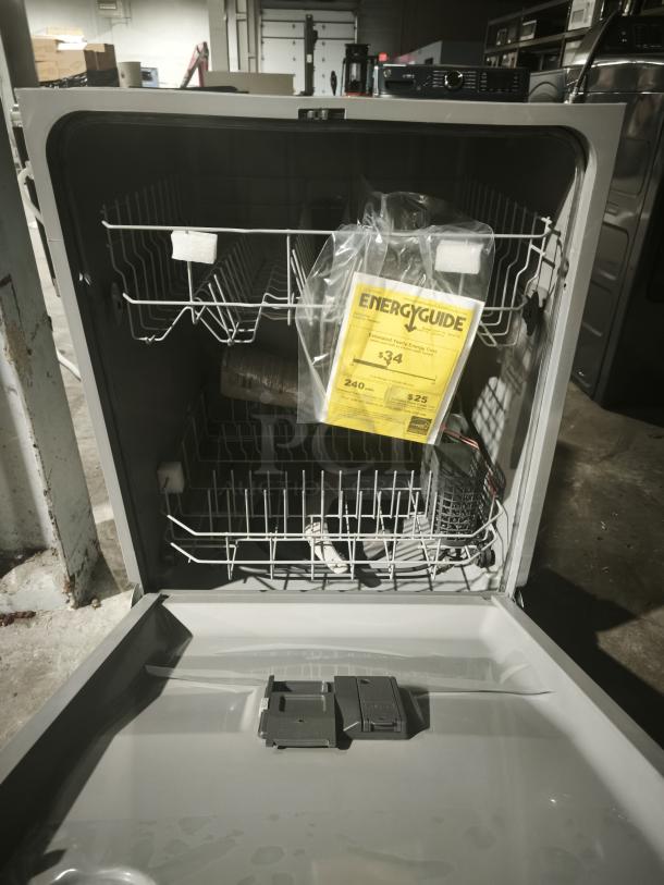 GE Energy Star Dishwasher Model GDF535PSRSS, new, open door view. Includes EnergyGuide label showing $34 estimated yearly energy cost.