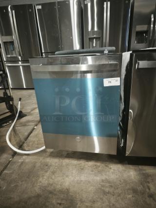 New GE dishwasher model GDT550PYRFS, top control, stainless finish, sanitize cycle, and Dry Boost™. Plastic interior, pristine condition.