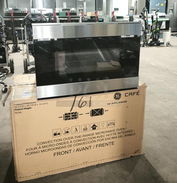 Brand new Sharp Smart Microwave Drawer, model SMD2489ES, stainless steel finish, displayed on packaging box.