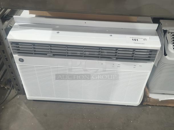 Brand new GE AWCS24WWL 24,000 BTU smart window air conditioner. Scratch and dent condition. Tags show model details.