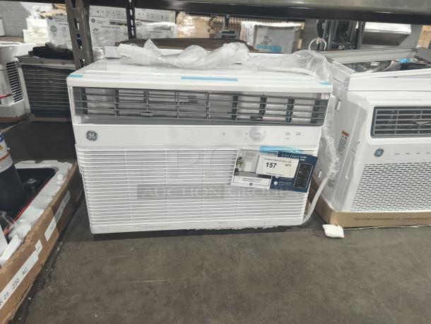 Brand new GE 8,000 BTU smart window AC (model AWGH08WWF1) with 3,800 BTU heating, Wi-Fi, eco mode, remote, tags attached.