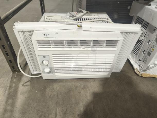 BRAND NEW GE AWFS05BWL 5000 BTU window air conditioner for small rooms. Scratch and dent. Mechanical controls visible.