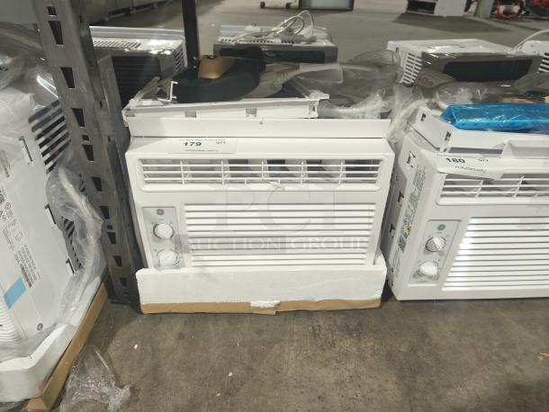 BRAND NEW GE 5000 BTU Mechanical Window Air Conditioner, Model AWFS05BWL, for small rooms up to 150 sq ft, slight cosmetic damage.