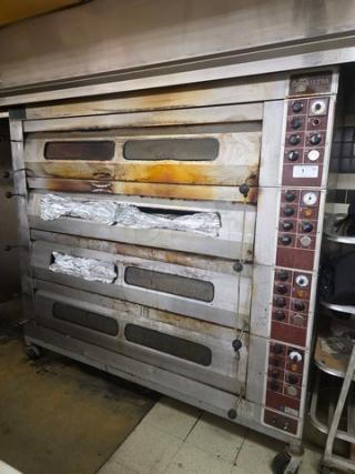 Bakers Aid Ultra Deck Oven, Model BADO-434HC, 4 decks, 208 3 Phase, 60Hz, on casters, visible wear, control panel intact.
