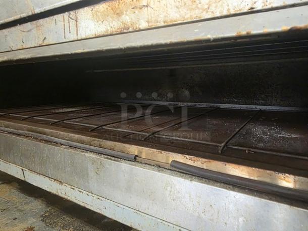 Bakers Aid Ultra Deck Oven, Model BADO-434HC, 4 decks, used condition, 208 3 Phase, on casters, interior view.
