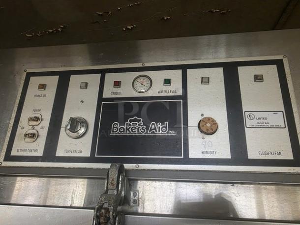 Bakers Aid Proof Box BAPIS-2D-S5 control panel with temperature, humidity dials, and labels indicating operational status.