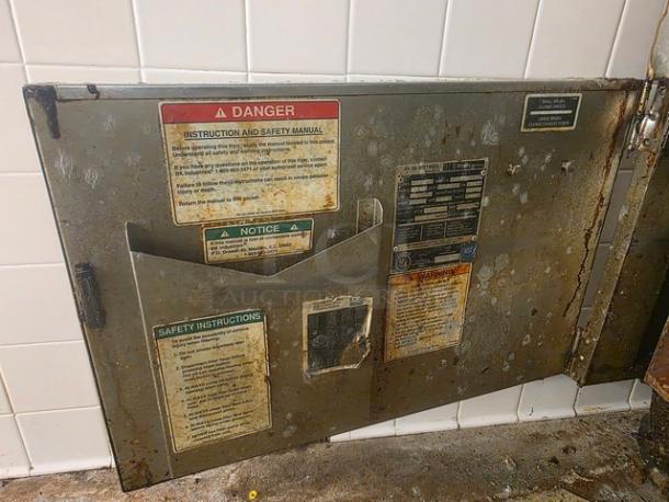 BKI Electric Commercial Deep Fryer FKM-FC with 48A, 3 PH, 208V, 60 Hz power. Shows worn safety and operation labels.