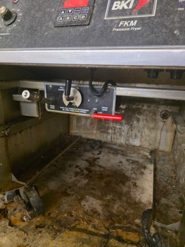 BKI Electric Commercial Deep Fryer, model FKM-FC, shows control panel and interior. Used condition, visible wear.