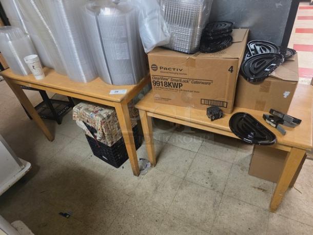 Lot of 2 wooden tables, medium finish, rectangular shape, gently used. Contents on top not included.