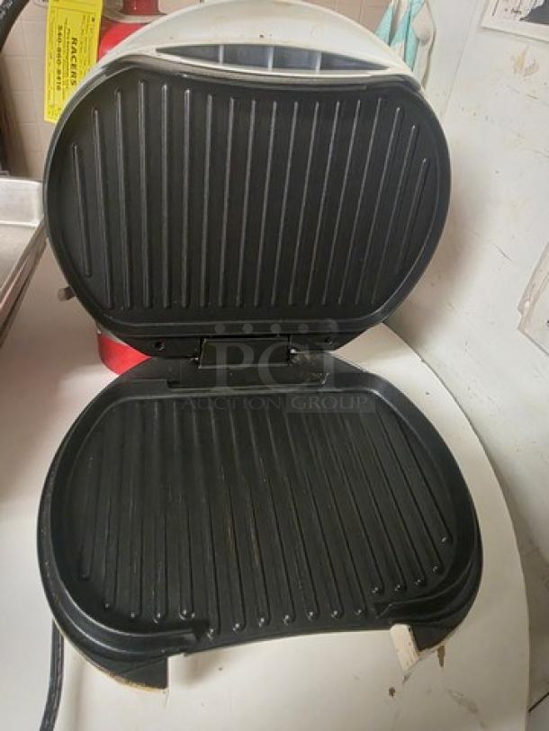 Hamilton Beach HealthSmart Contact Grill, open, showing ridged non-stick grill plates, used condition.