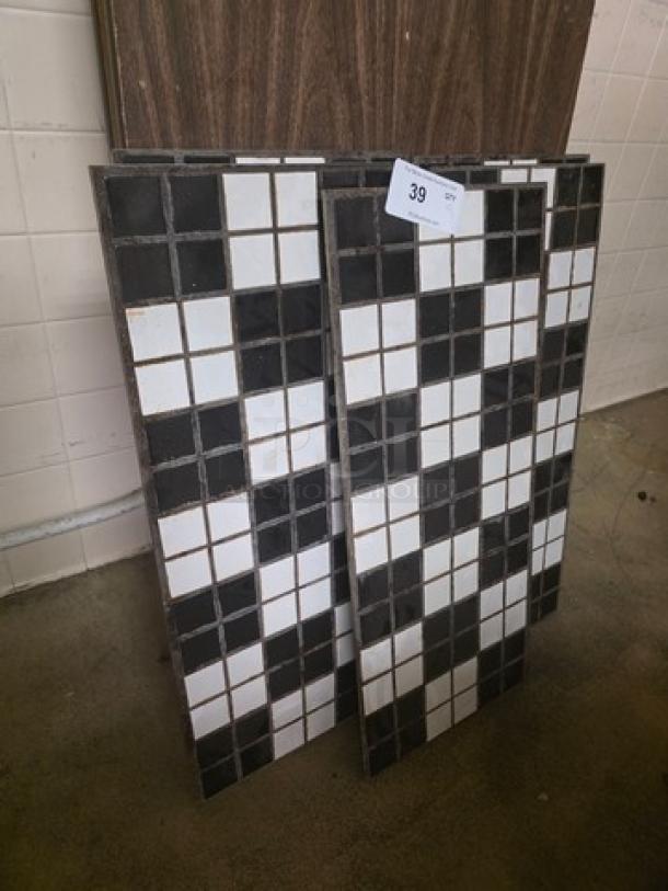 Lot of 5 black and white checkered tiles, excellent condition, ideal for flooring or wall decor. Auction tag indicates "39".