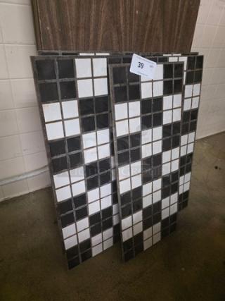 Lot of 5 black and white checkered tiles, excellent condition, ideal for flooring or wall decor. Auction tag indicates "39".