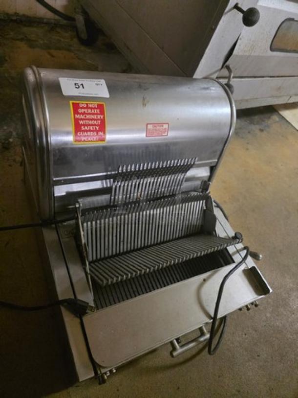 Berkel MB Series countertop bread slicer, 115V, stainless steel, with operational and safety labels visible. Used condition.