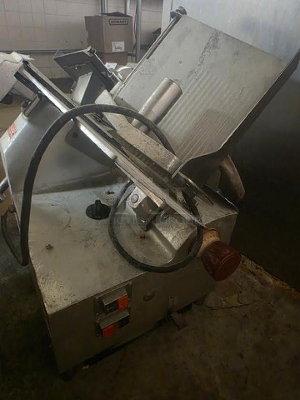 Fleetwood Deli Slicer Model 1412, used condition, 115V, 60Hz, stainless steel, industrial, visible wear signs.