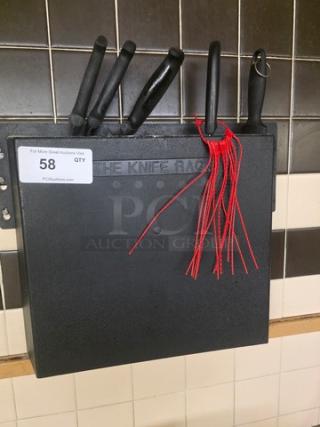 Knife rack with five black-handled knives mounted on a tiled wall; labeled "The Knife Rack" with auction tag "58."