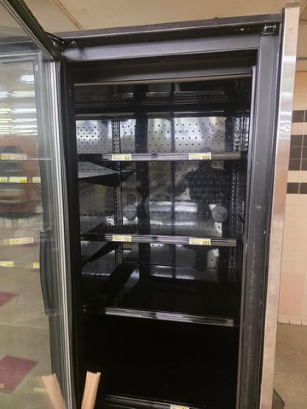 Hill Phoenix ONRZ3 glass door frozen food display case, narrow depth, standard height, 3 doors, good condition.