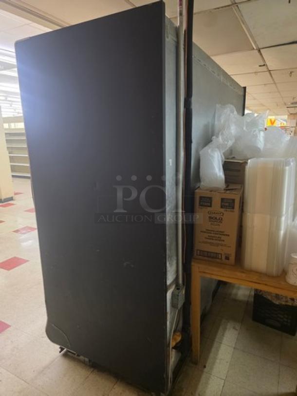 Hill Phoenix ONRZ3 glass door frozen food display case, 3-door, narrow depth, standard height, buyer removal required.