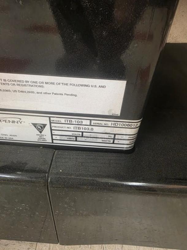 Henny Penny HMI-103 heated food table, model ITB-103, serial HD1006012, 60 Hz, 1 PH, 120/208V, in good condition.