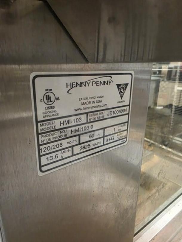 Henny Penny HMI-103 Heated Food Table, 60 Hz, 1 PH, 120/208V, UL listed, stainless steel, model label visible.