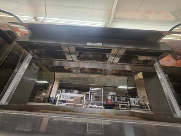 Henny Penny HMI-103 heated food table, stainless steel, 60 Hz, 1 PH, 120/208V, with visible controls and heating elements.