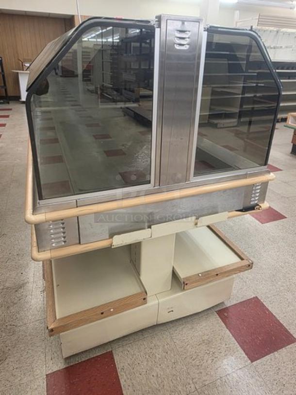 Henny Penny HMI-105 Hot Food Case, 120/208V, 60Hz, 1PH, glass front, wood trim, stainless steel frame, used condition.