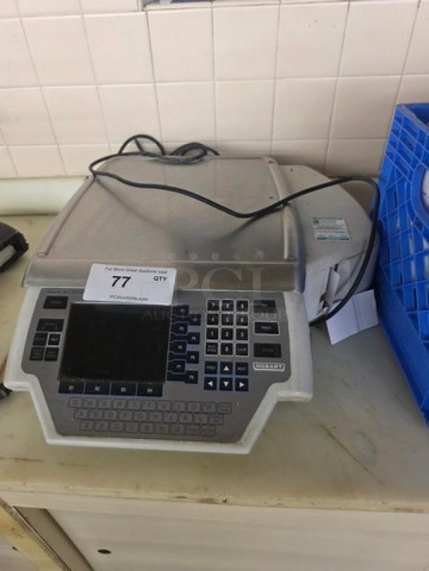 Hobart Quantum Scale with digital display and keypad, silver casing, moderate wear, includes power cable.