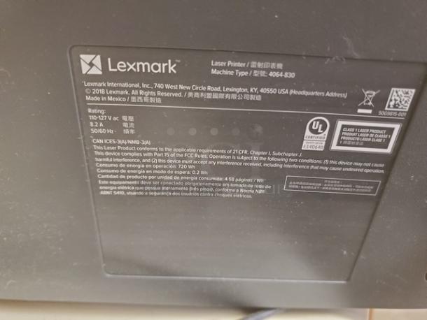 Lexmark MS725 Monochrome Laser Printer, model 4064-830. Features UL certification label and compliance information.