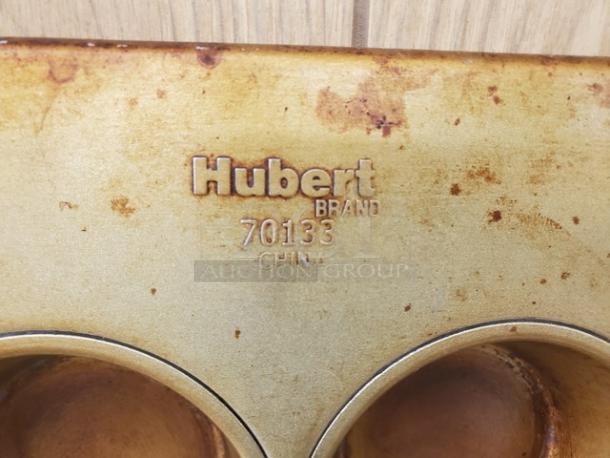 Lot of 2 Hubert Brand muffin pans, model 70133, used condition, visible wear and stains, made in China.
