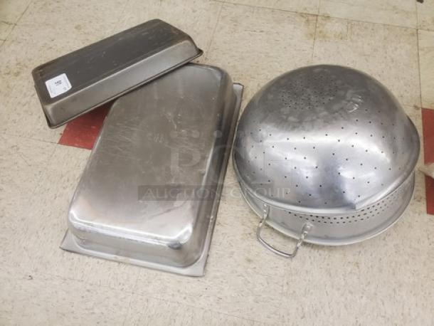 Lot of miscellaneous food pans and perforated bowls, stainless steel, used condition, includes various sizes and shapes.