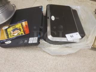 Epson Perfection V30 scanner and Canon PIXMA iP4820 printer, auction lot, gently used condition, includes sale tag.