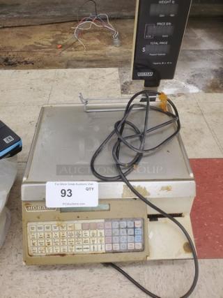 Hobart SP1500 Commercial Digital Scale with Printer, visible wear, keypad, and display, ideal for retail use.