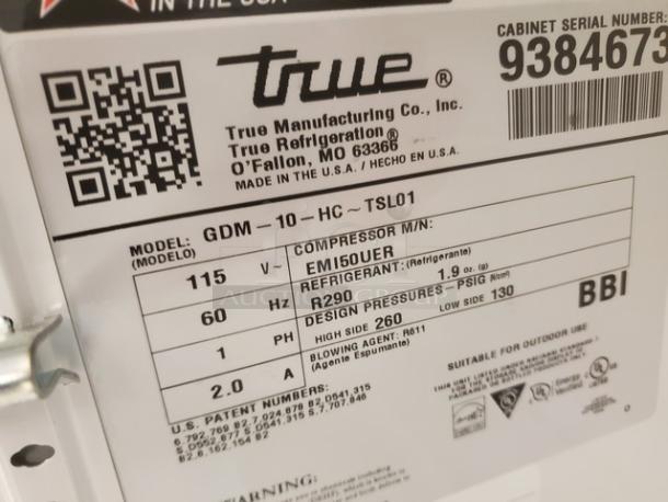 True GDM-10-HC~TSL01 merchandiser label, detailing model, 115V, 60Hz, R290 refrigerant. Manufactured by True in the USA.