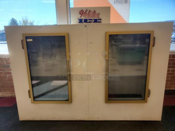 Leer Indoor Ice Merchandiser, Model M1000AGR404, with two glass doors and visible "Holiday Ice" signage on top.