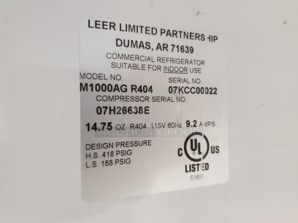 Leer Indoor Ice Merchandiser, model M1000AGR404. Label shows 115V, 9.2A, R404 refrigerant, UL listed.
