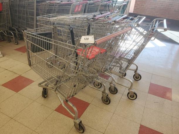 Lot of 5 shopping carts, metal construction, standard size, lightly used condition, auction tag marked as 120.