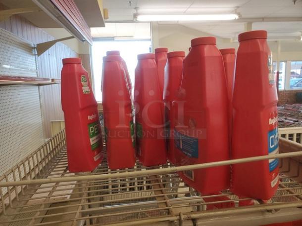 Lot of 16 red jugs of carpet cleaner/odor remover on display shelf. RugDoctor branded, suitable for various flooring types.