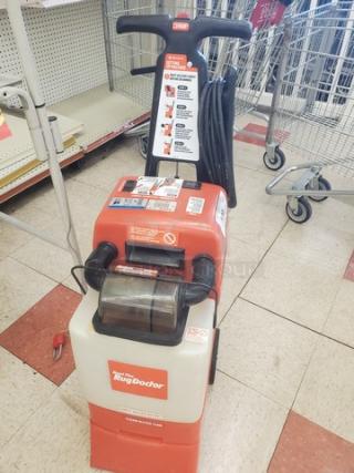 Rug Doctor Deep Carpet Cleaner, red and white, upright model with visible controls and handle. Good condition.