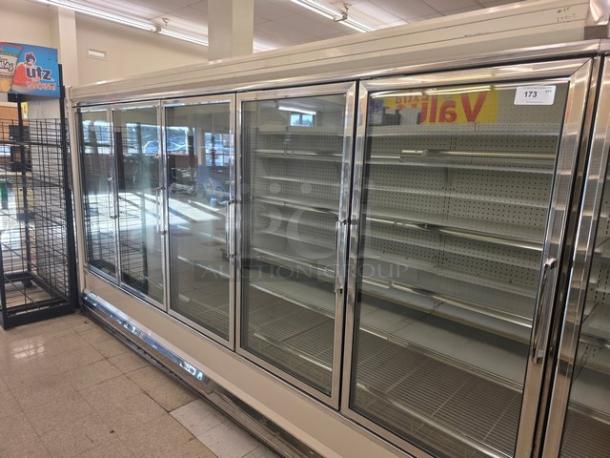 Kysor/Warren freezer display case, model LV5H1-5U, four glass doors, missing compressor, sold by the door, locate at aisle 173.