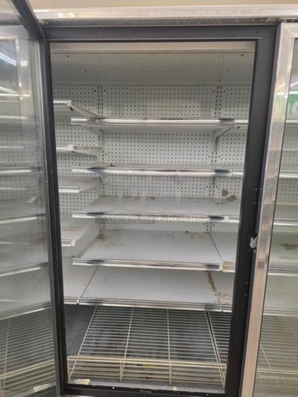 Kysor/Warren freezer display case, model LV5H1-5U, no compressor, shelving inside, sold by the door, removal required.