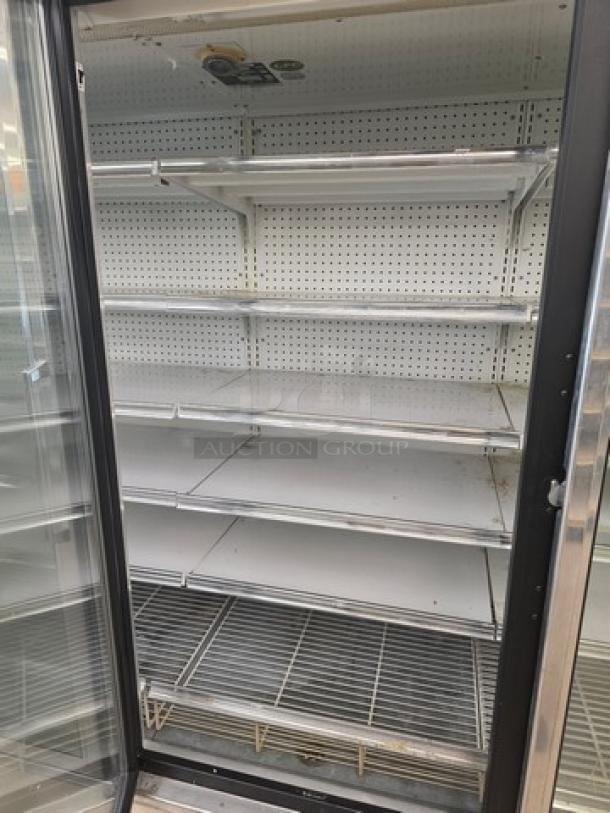 Kysor/Warren freezer display case, model LV5H1-5U. No compressor, sold by the door. Buyer responsible for removal.