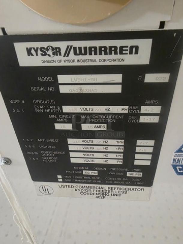 Kysor/Warren freezer display case label, model LV5H1-5U, specifying voltage, amps, and serial number. No compressor included.